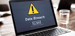 Laptop screen with Data Breach warning